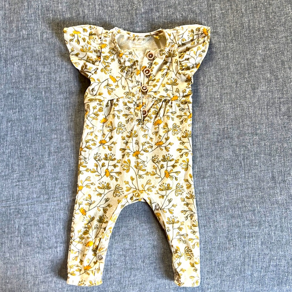 Jessica Simpson floral romper. 3/6 months.